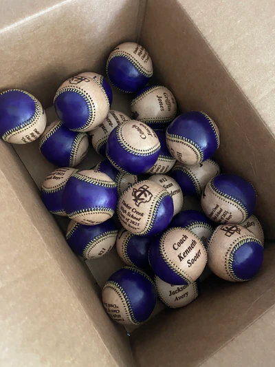 Box of personalized baseballs