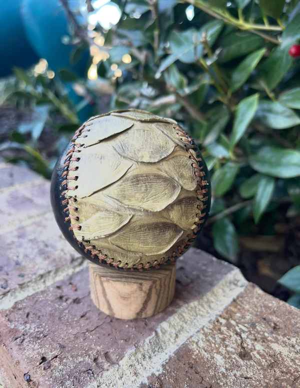 Beige and tan scaled exotic baseball